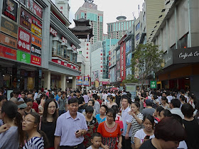 crowds at the Dongmen shopping area in Shenzhen, China