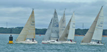 J/Teams sailing SORC Nab Tower race off Cowes, England