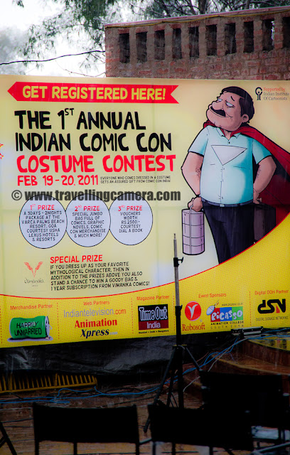 First Annual Indian Comic Con at DILLI HAAT, New Delhi : Feb 19-20, 2011 : Posted by VJ SHARMA on www.travellingcamera.com : Comic con has been a grand event for comic enthusiasts in various parts of United States of America and now a new event in India has increased the count of total comic cons across the world !!! This Year, India hosted first Comic Con at Dilli Haat, New Delhi !!! There are huge enthusiasm among Indians.. be it children, youngsters or senior folks.. Check out these Photographs to have a virtual tour of Indian Comic Con on second day (20th Feb, 2011) !!!Main poster of First Indian Comic Con Event which happened in Delhi last month and it was used as background for main area where many events happened and folks from this industry presented some innovative stuff or talks !!Another poster of First Annual Indian Comic Con at Dilli Haat !!! As this hoarding is saying, there were lot of prizes for folks who came there in various dress-ups to look like any comic Character.. Comic characters like Chacha Chowdhary, Wolverine, Lord Krishna, Spiderman,Zombie, Kalki, Crime Master Gogo, Batman, Harley Quinn etc... These were few comic Charcters which I saw during second day and rain spoiled i during the evening :( .... But never mind, it was good to see this kind of event in India and it would be great if they can organize it in various cities of India because there are lot of comic fans spread over the country !!!Here comes Mr. Chaitanya Vats who was one of the popular person in Indian Comic Con.. He is acting as Wolverine !!! and everybody wanted to have a photograph with him !!! Good work Dude !Vikas looks tired but its sadness because of rains.. It rained around 4:00 pm and the event was in open area.. So everyone dispersed and went under various stalls installed by different comic publishers... Vikas and Anu had great time at Comic Con and enjoyed nice snacks in Dilli Haat !!! but surprisingly no shopping :) (I mean very less shopping) Here comes Mr. Andy Dodd as Chacha chowdhary which was most famous comic character of my times.. In my childhood m friends used to read lot of his comics and the other one was Nagraj I guess :) Most of them used to buy these comics, read them in classroom and exchange with each other...Lord Krishna giving interview to some TV channel and zombie came to disturb him.. And Lord Krishna trying to request for SHANTI and zombie didn't know who is SHANTI & where to find her !!! Finally Lord Krishna was able to negotiate with Zombie both of them were talking to media folks about First Indian Comic  Con in delhi & overall experience of this event !!!How come Zombie is calmly replying to Krikhna's questions? The commendable thing about both of these folks was the effort they had put to get prepared for Comic Con.. Make-up done by Zombie was unique and it must have taken lot of time to get ready for final day of the event !!!Many of the youngsters were really fan of zombie.. He was the one who was doing real acting.. be is walking, talking or giving weird expressions :) Children were really scared of him .. They liked him but didn't want to go closer to him to get a photograph.. Yes, getting clicked with these characters was most popular activity of this whole event.. I think many of the visitors were more interested in getting a photographs rather than anything else...There were lot of cute babies roaming around with colorful dress-ups.. This shy boy was here as Spiderman :)Kalki - That's the name of this character and I was wondering how can he stand like this in winters and rains must have made it more difficult for him.. Great work dude !!!He was just standing inside a comic stall and not that involved with the visitors of Indian Comic Con event.. Other characters were just roaming around the place to entertain folks by their expressions or by other means Batman and Harley Quinn : Rajat and Monika !!! Monika was the only girl I saw on second day... Actually I was at wrong time of the day when rain was about to start .. I had seen few more girls but couldn't catch them.. This group of Batman, Harley Quinn, Crie Master Gogo and Wolverine was most energetic group out there.. I am not sure who won the prize but for me this group rocked the show !!!Again the same group giving different expressions !!! Great show Guys !Rocking group of folks as various characters if Comic Con India at Dilli Haat !!!TRP Stunts :) which are very important these days !!!Harley Quinn looking at the digicam ... I liked her shoes btw :)Here comes our little Comic characters and visitor getting photographs with these celebrities of the day !!!Lord Krishna also got a Bansuri and silently playing it !!!Anu didn't want any pic but Vikas managed to convince her for the first try .. and now on it was easy :)Thanks for the nice pose :) 