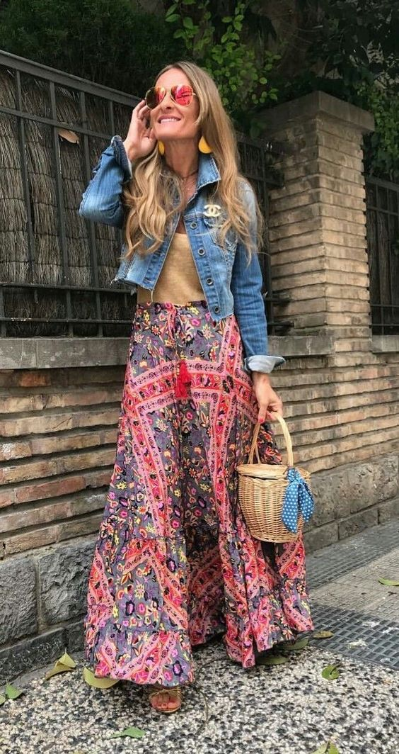 lady layering her Bohemian outfit with a jean jacket
