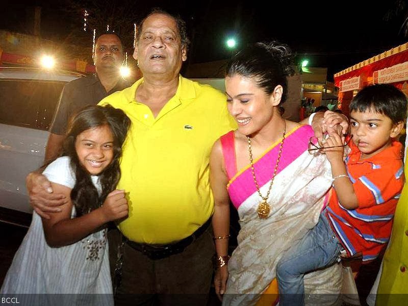 Kajol spotted with daugher Nyasa and son Yug during Durga Puja celebrations, held in Mumbai, on October 10, 2013. (Pic: Viral Bhayani)