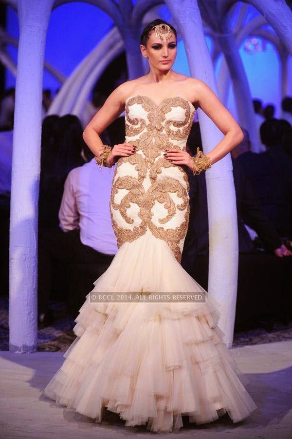 A model walks the ramp during Shantanu and Nikhil's Autumn Winter Couture show in association with Johnnie Walker Black Label and JW Marriott New Delhi Aerocity.