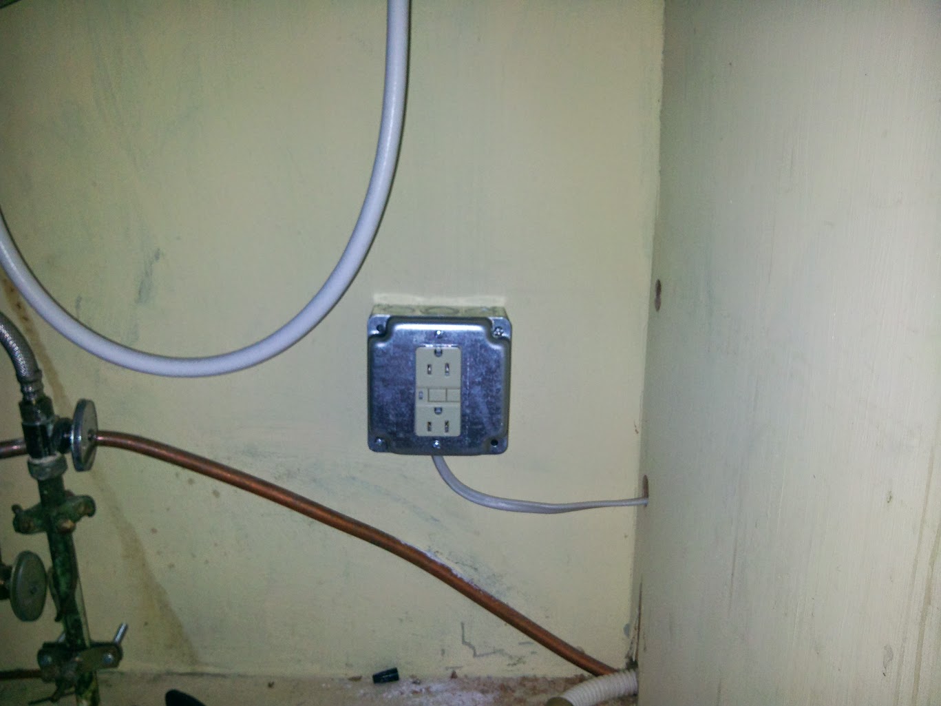 Surface mount electrical box under sink