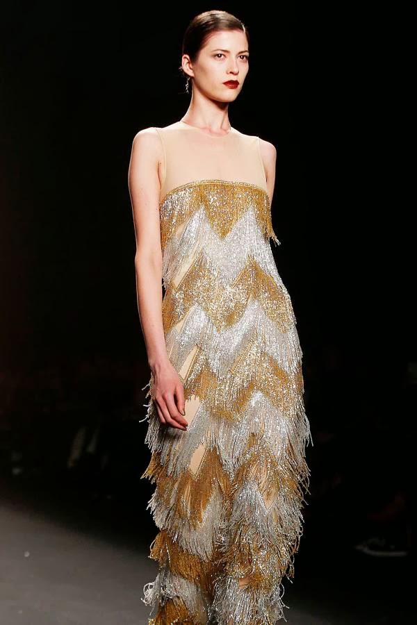 A model presents a creation by Naeem Khan as part of the Fall 2014 collection during New York Fashion Week on February 11, 2014.