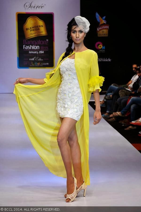 A model walks the ramp in a creation by designers Disha and Menaka during Blenders Pride Bangalore Fashion Week.<br /> 