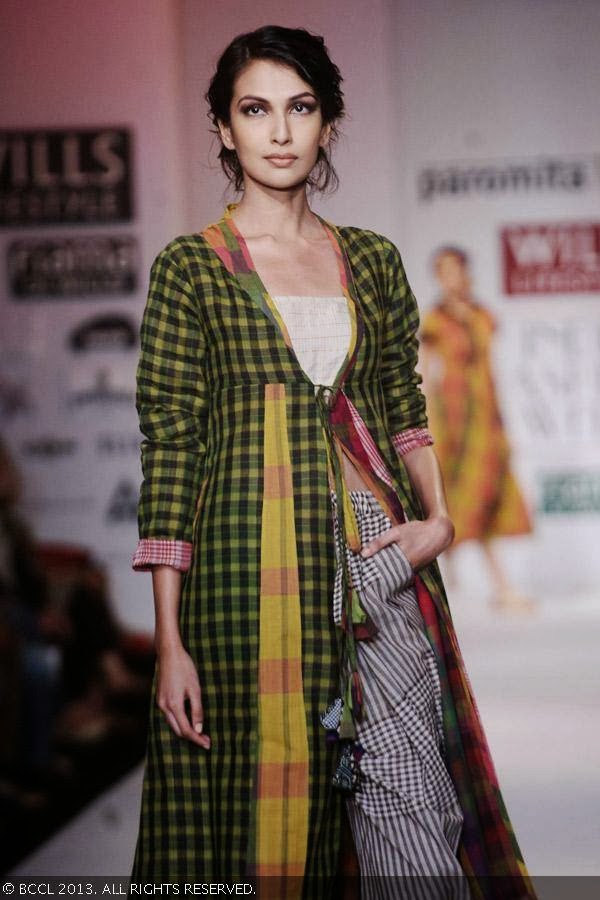 Sanea Sheikh walks the ramp for fashion designer Paromita Banerjee on Day 2 of the Wills Lifestyle India Fashion Week (WIFW) Spring/Summer 2014, held in Delhi.