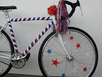 These little stars clipped to the spokes didn't make the final cut, but I still think it's kind of cute. The stars were painted wood attached to mini clothespins.