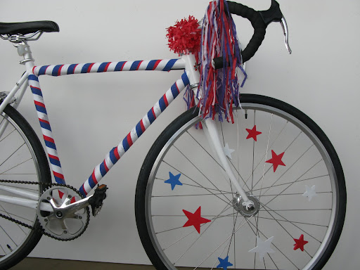 These little stars clipped to the spokes didn't make the final cut, but I still think it's kind of cute. The stars were painted wood attached to mini clothespins.