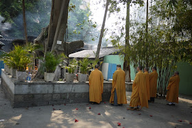 monks praying at Kun Iam Temple in Macau