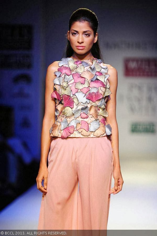 Donna flaunts a creation by fashion designer Nachiket Barve on Day 1 of Wills Lifestyle India Fashion Week (WIFW) Spring/Summer 2014, held in Delhi.