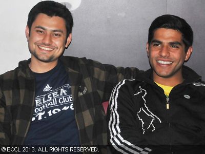 Pranay (L) and Rahul at a comedy gig at Cafe Morrison, New Delhi.