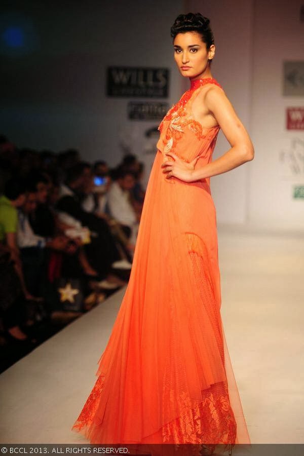 Kanishtha Dhankar showcases a creation by fashion designer Sulakshana on Day 5 of Wills Lifestyle India Fashion Week (WIFW) Spring/Summer 2014, held in Delhi.