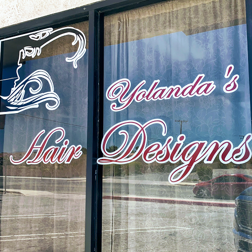 Yolanda's Hair Design logo