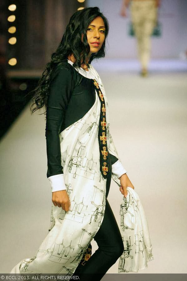 Candice Pinto walks the ramp for fashion designer Masaba on Day 1 of the Wills Lifestyle India Fashion Week (WIFW) Spring/Summer 2014, held in Delhi.