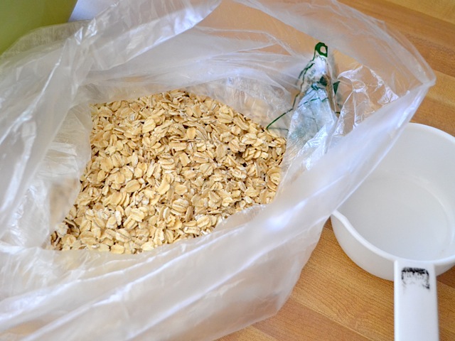 rolled oats in a bag with measuring cup on the side 