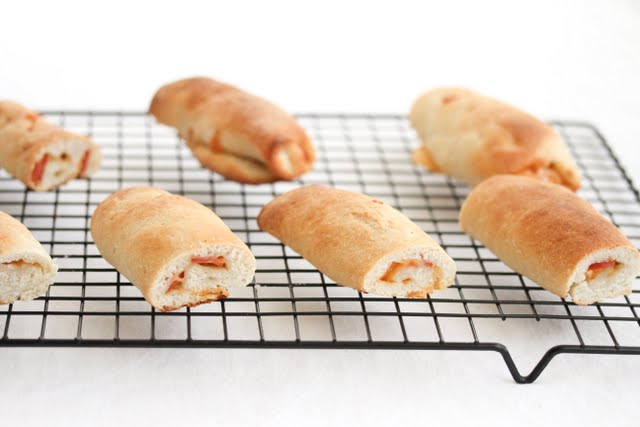 photo of pizza rolls on a baking rack