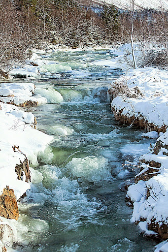 Frozen river. Winter Storm Kyrre, Northern Norway