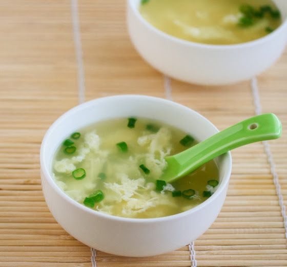 photo of a bowl of soup with a spoon