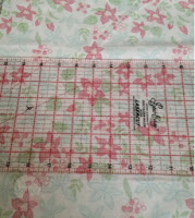 A ruler can help smooth the fabric A ruler can help smooth the fabric
