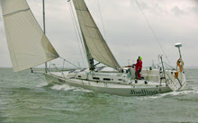 J/122 sailing single-handed off Cowes, England on Solent