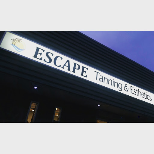 Escape Tanning & Esthetics logo