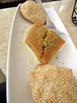 Baltimore Lebanese Taverna  Knafe bel jibne a dish of sweet cheese tart, golden semolina crust and sesame seed biscuit