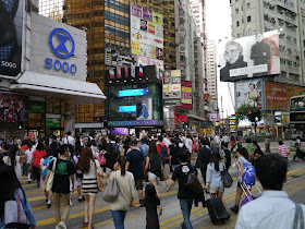 People crossing Hennessy Road in Causeway Bay, Hong Kong