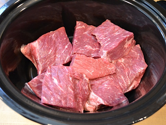 roast cut into chunks and put in slow cooker 
