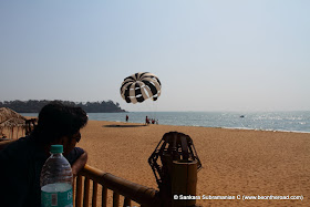 Enjoying the parasailing show at Rajbaga Beach