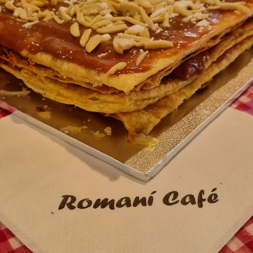 Romani Cafe logo
