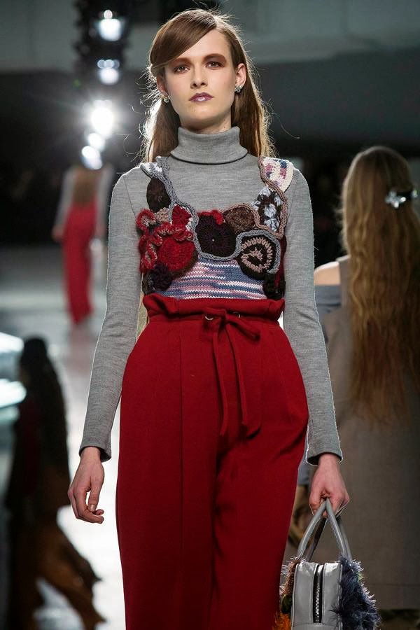 A model presents a creation from Rodarte's Fall/Winter 2014 collection during New York Fashion Week on February 11, 2014.