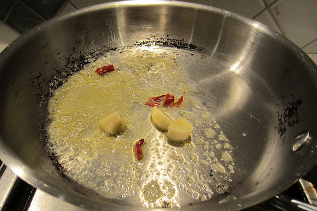 Prepare butter, garlic, and chilli peppers