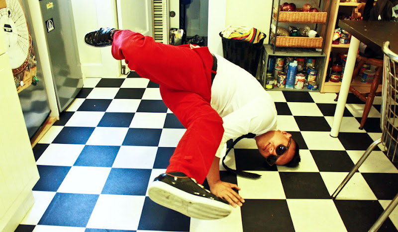 Red Cordarounds Break Dance on checkered floor