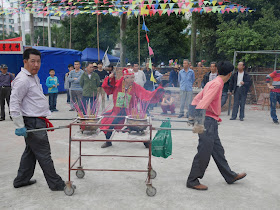 rituals at a temple for the Nian Li Festival (年例节) in Maoming, China