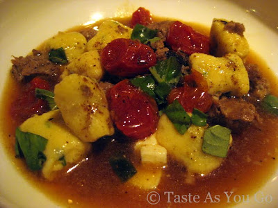 Ricotta Gnocchi with Homemade Turkey Sausage, Oven-Dried Tomatoes, Baby Spinach, and Mozzarella at BLT Market in New York, NY - Photo by Taste As You Go