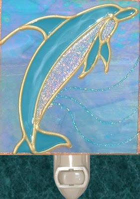 dolphin on bluegreen glass