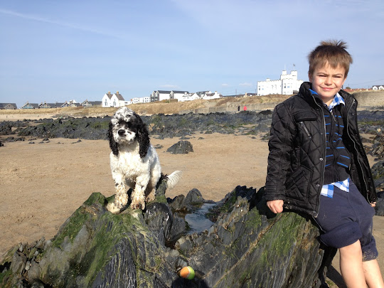 Ben Roters and Charlie Brown American cocker spaniel, having there photo took