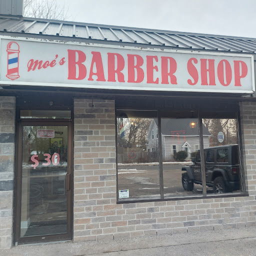 Moe's Barber Shop logo