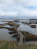 Precarious jetty out to the boats at Felixstowe Ferry