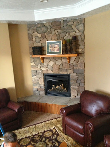 how to decorate around a corner fireplace