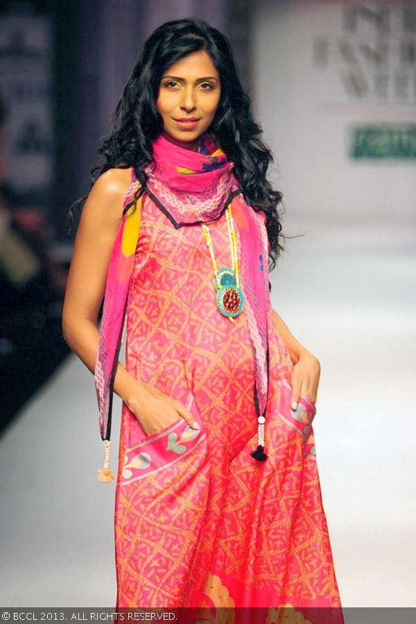 Candice Pinto walks the ramp for fashion designer Anupama Dayal on Day 1 of the Wills Lifestyle India Fashion Week (WIFW) Spring/Summer 2014, held in Delhi.