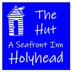 The Hut Sea Front Inn Holyhead logo