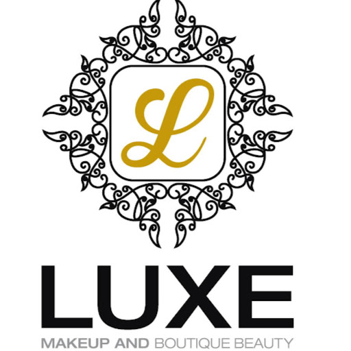 Luxe Nails & Beauty logo