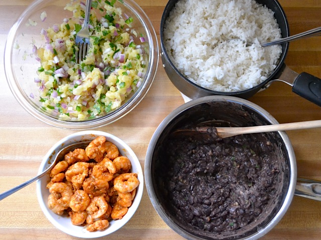 all four components in bowls (salsa, shrimp beans, rice)