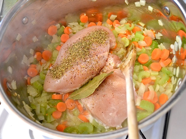chicken, celery, carrots and herbs addd to pot 