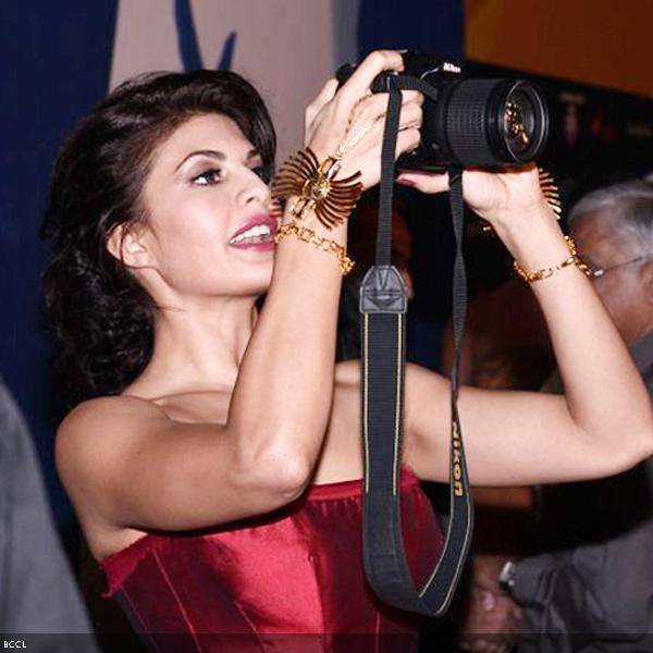 Jacqueline Fernadez gets behind the lens during the14th International Indian Film Academy (IIFA) 2013 Rocks event, held at The Venetian hotel in Macau, on July 5, 2013. (Pic: Viral Bhayani)