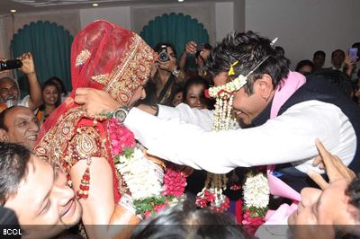 Wedding couple Udita Goswami and Mohit Suri exchange garlands during their wedding ceremony, held at ISKCON Juhu in Mumbai on January 29, 2013. (Pic: Viral Bhayani)