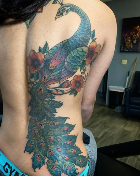 The trendy colorful peacock Tattoo Art On The back