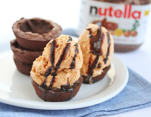 close-up photo of a ice cream in a nutella brownie bowl