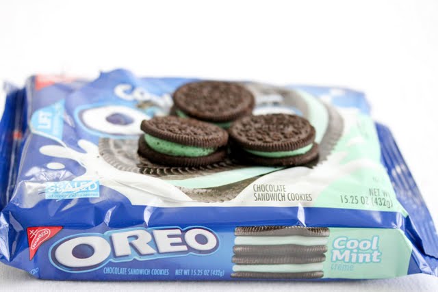 photo of three mint oreos on a package of oreos